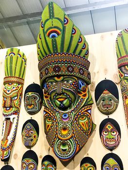 Beaded tribal masks in Bogota, Colombia market.