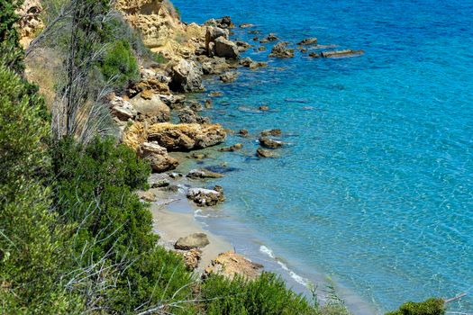 Rocky beach closeup in the seaside Messenian area during the summer period. Messenia, Peloponnese, Greece.