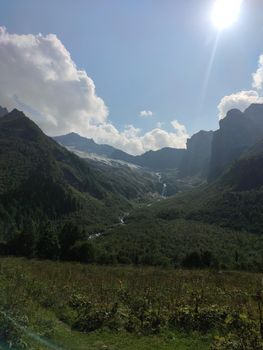 Summer mountains valley canyon wide summer panorama North Caucasus landscape, Dombai, Russia.