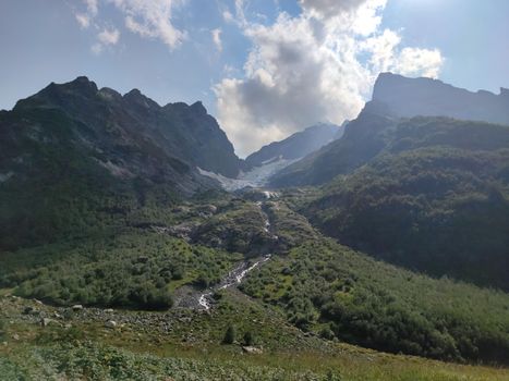 Summer mountains valley canyon wide summer panorama North Caucasus landscape, Dombai, Russia.