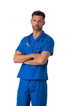 Male nurse in blue uniform with stethoscope standing with arms crossed isolated on white background