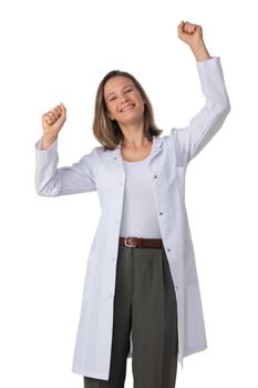 Young female medical doctor with stethoscope with raised arms isolated on white background