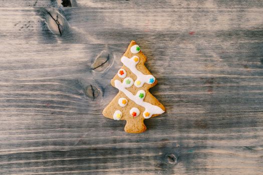 Christmas homemade gingerbread cookies with cinnamon and anise on old wooden background with space for text. Merry Christmas and Happy New Year. Xmas concept. Top view. Copy space. High quality photo