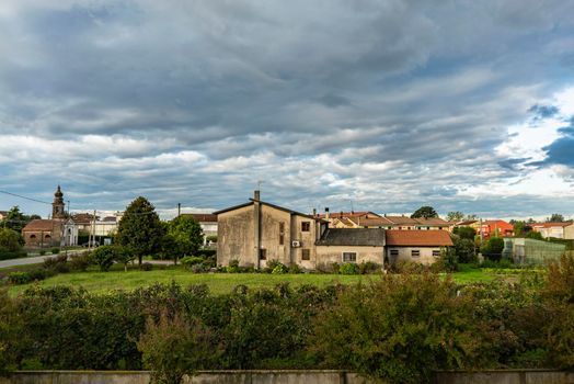 Countryside village cloudy landscape panorama in autumn