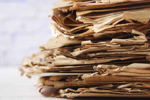 stack of Old papers on table .