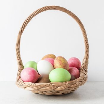 colorful easter eggs hay basket front view. Resolution and high quality beautiful photo