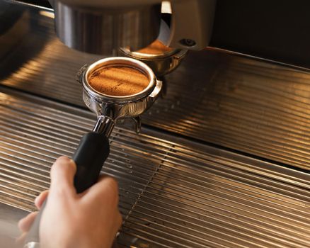 close up hand preparing coffee with machine. Resolution and high quality beautiful photo