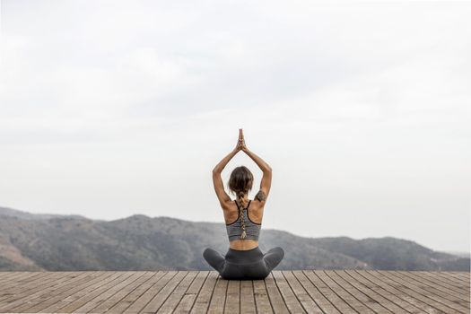 Back view of woman doing yoga outdoors Picture on pik. Resolution and high quality beautiful photo