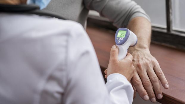 patient having his temperature checked 2. Resolution and high quality beautiful photo