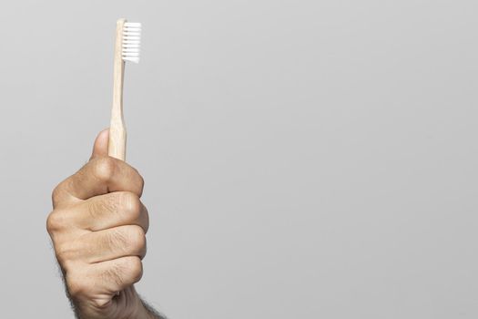 close up hand holding toothbrush. Resolution and high quality beautiful photo