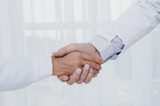 close up doctors shaking hands. Resolution and high quality beautiful photo