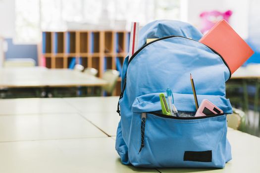 blue schoolchild backpack table. Resolution and high quality beautiful photo