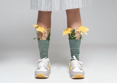 close up woman with flowers socks. Resolution and high quality beautiful photo