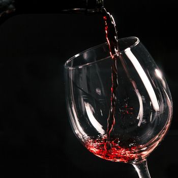 close up wine pouring into glass. Resolution and high quality beautiful photo