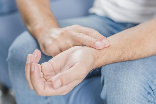 close up man s hand checking pulse. Resolution and high quality beautiful photo