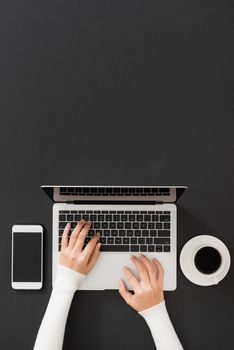 Workspace with laptop, girl's hands.Flat lay computer