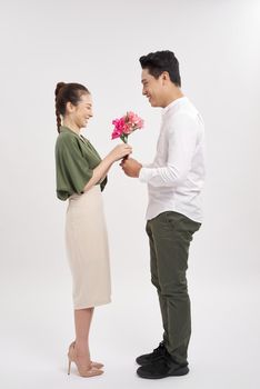 man gives a rose to a woman, happiness