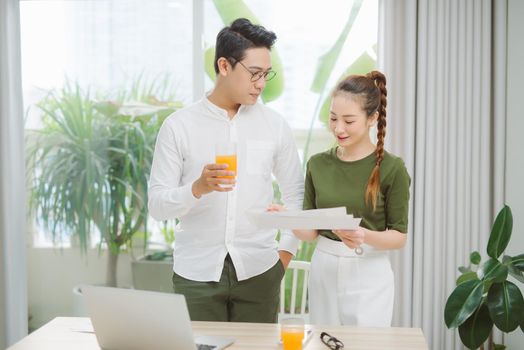 Couple working on project together from home