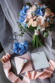 elegant wedding bouquet of fresh natural flowers and greenery