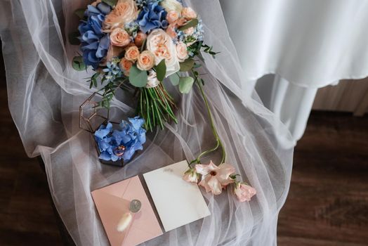 elegant wedding bouquet of fresh natural flowers and greenery