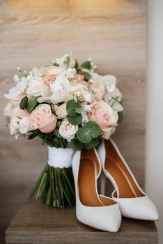 elegant wedding bouquet of fresh natural flowers and greenery