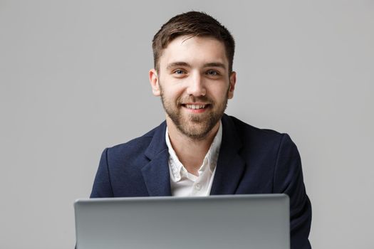 Business Concept - Portrait Handsome Business man playing digital notebook with smiling confident face. White Background.Copy Space.