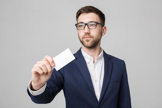 Business Concept - Portrait Handsome Business man showing name card with smiling confident face. White Background.Copy Space.