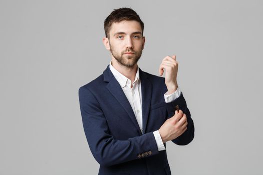 Business Concept - Young successful businessman posing over dark background. Isolated White Background. Copy space.