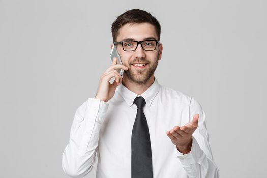 Business Concept - Portrait Handsome Business man on phone with smiling confident face. White Background.Copy Space.