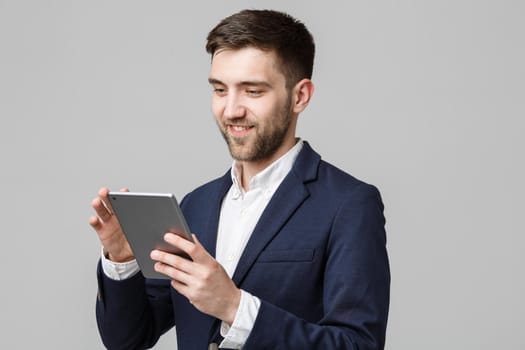 Business Concept - Portrait Handsome Business man playing digital tablet with smiling confident face. White Background.Copy Space.