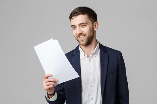 Business Concept - Portrait Handsome Business man happy working with annual report. White Background. Copy Space.