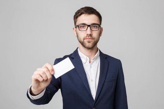 Business Concept - Portrait Handsome Business man showing name card with smiling confident face. White Background.Copy Space.