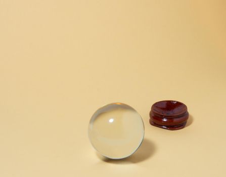 Crystal ball on a yellow background.

