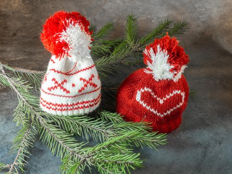 Christmas hats  on fir branches. Christmas decoration. New Year's atmosphere.  
