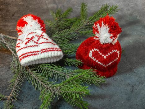 Christmas hats  on fir branches. Christmas decoration. New Year's atmosphere.  

