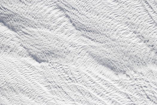 Gray - white texture of Pamukkale calcium travertine in Turkey, abstract pattern of the feathers close-up.