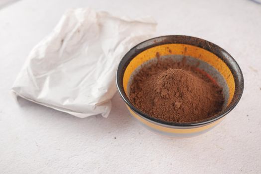 coco powder in a bowl on table