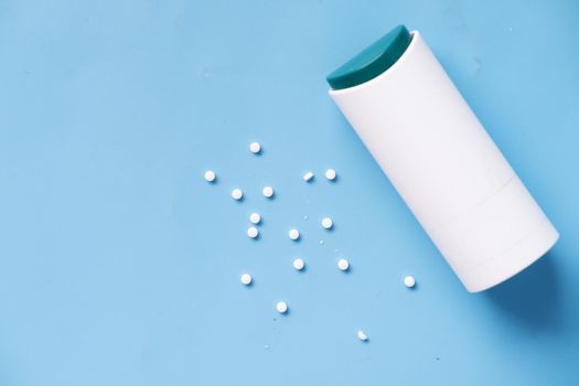 artificial sweetener container on table .