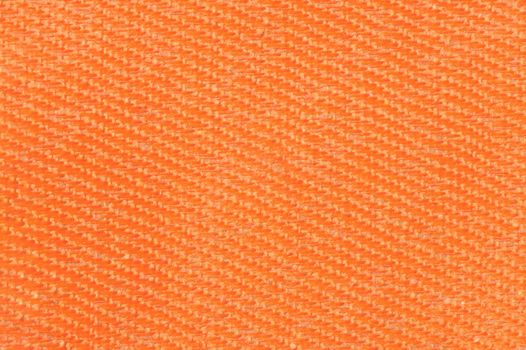 Orange canvas fabric texture background. Textile and decoration concept. Wallpaper and interior design