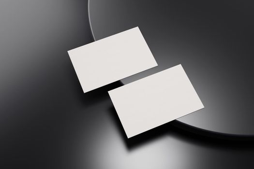 Black and white business card paper mockup template with blank space cover for insert company logo or personal identity on black chromium floor background. Modern concept. 3D illustration render