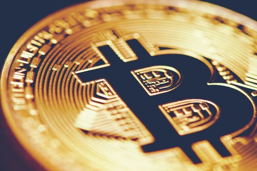Golden Bitcoin. Closed up bit coin. Cryptography and Electronic money concept. Currency trading and Gold mining theme. Business and Technology theme.