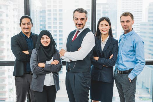 Portrait of business people group having confident in successful job in modern office background. People lifestyle and partnership colleague concept. Teamwork and cooperation diversity and multi-ethics