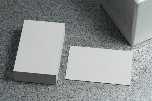 White horizontal business card paper mockup template with blank space cover for insert company logo or personal identity on marble floor background. Modern concept. 3D illustration render