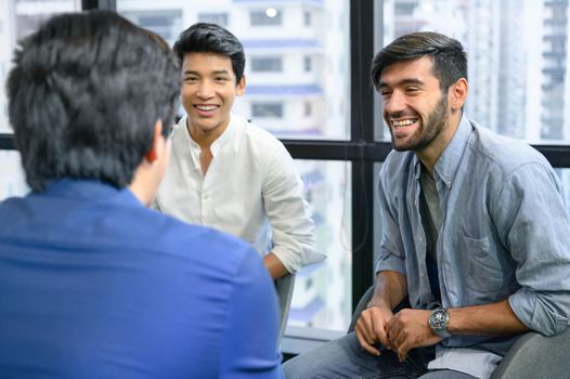 Psychotherapist inquiring about symptoms occurring within mind from patients with mental health problems in hospital. Group psychotherapy for support and helping worried man to change negative mindset