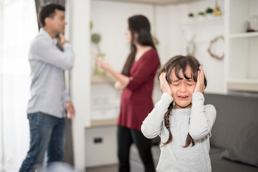 Little girl was crying because dad and mom quarrel, Sad and dramatic scene, Family issued, Children's Rights abused in Early Childhood Education and Social and parents care problem concept