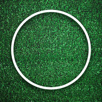 Circular white frame edge on green grass with shadow background. Decoration background element concept. Copy space for text insert in filled in black space.