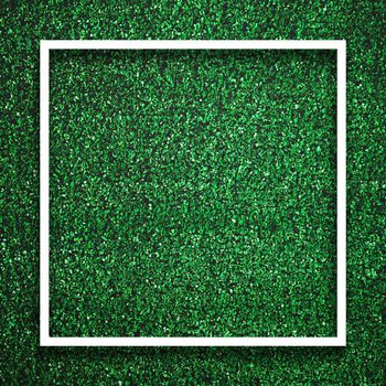 Rectangle square white frame edge on green grass with shadow background. Decoration background element concept. Copy space for text insert in filled in black space.