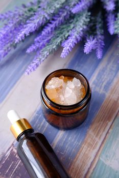 Herbal Lavender Salt And Essential Oil On Table .