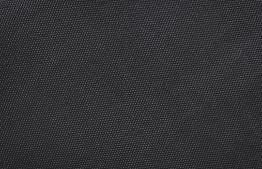 Black fabric canvas silk texture background. Abstract closeup detail of textile material wallpaper.