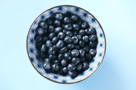 Close up of fresh blue berry with water drops